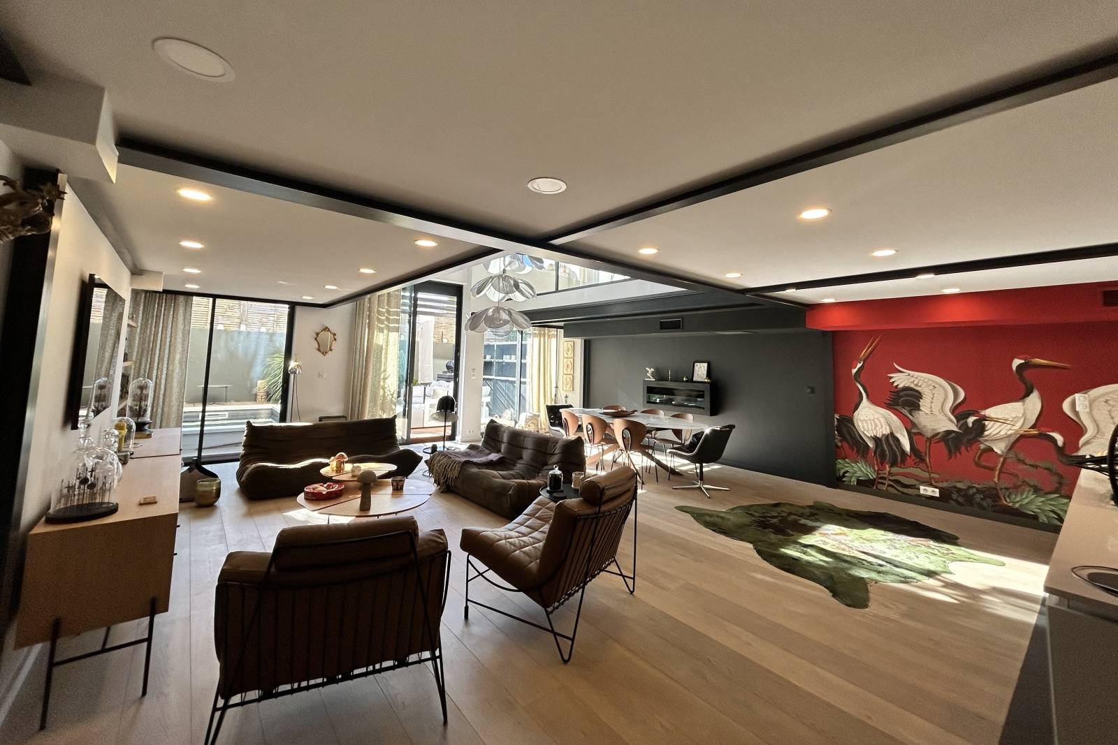 In Saint-Rémy-de-Provence, in the village center, a stunning, unique 150-square-meter loft with a courtyard and swimming pool.