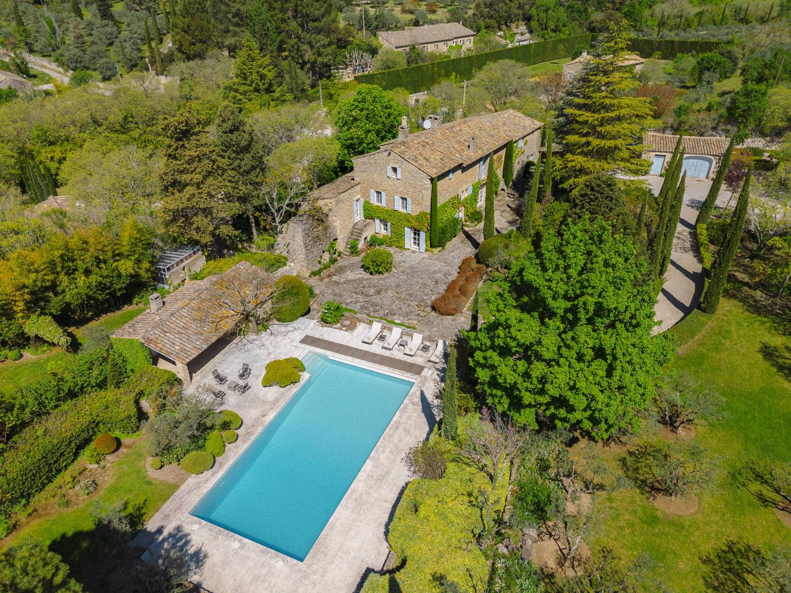 superb 19th century mas with swimming pool, garages and janitor's cottage on separate plot.