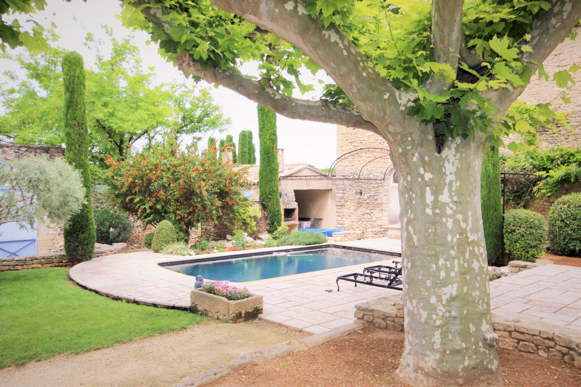 XVIII th century stone farmhouse in the center of a famous village