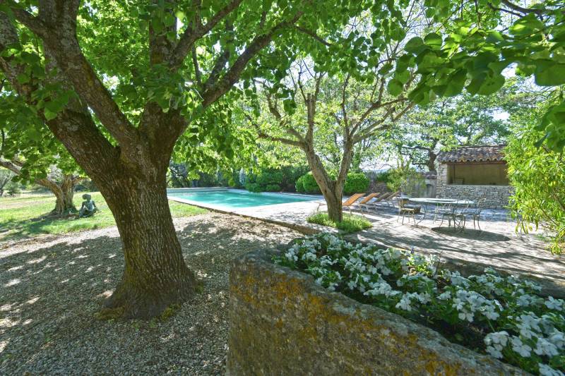 Authentic private stone hamlet with swimming pool and outbuildings set on 6 hectares of Provence in Gordes.
