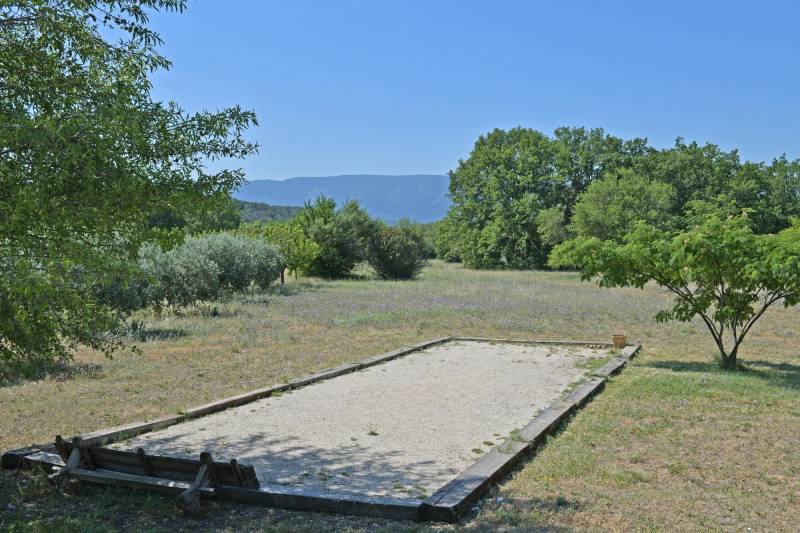 Authentic private stone hamlet with swimming pool and outbuildings set on 6 hectares of Provence in Gordes.