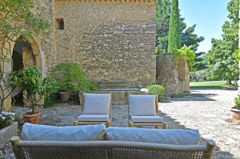 Authentic private stone hamlet with swimming pool and outbuildings set on 6 hectares of Provence in Gordes.