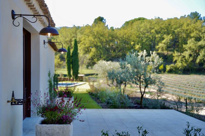 Near Oppède, a stunning renovated country house on 1 hectare of land with a pool, offering magnificent views of the Luberon.