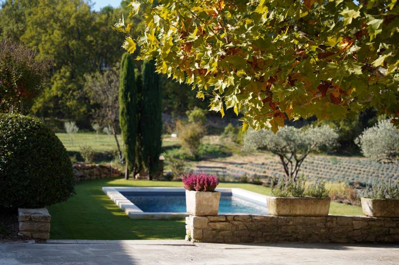 Near Oppède, a stunning renovated country house on 1 hectare of land with a pool, offering magnificent views of the Luberon.