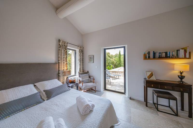 For rent in Gordes, characterful stone house in commanding position with breathtaking views over the Luberon valley, walking distance to the village.