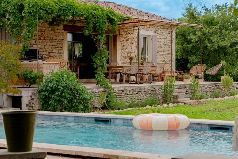 For sale in the hills above Gordes: an 8,500-square-meter property featuring two separate houses and a swimming pool.