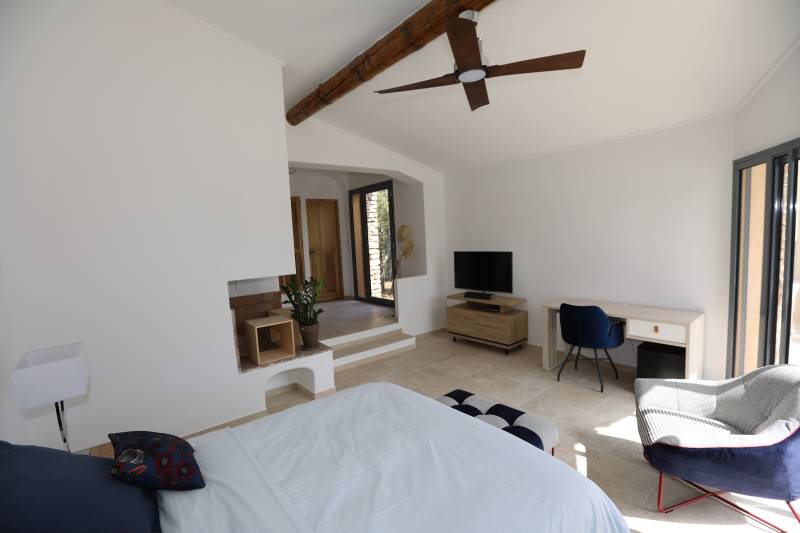 For rent, traditional Provençal stone house near the village of Gordes with pool and panoramic valley views.