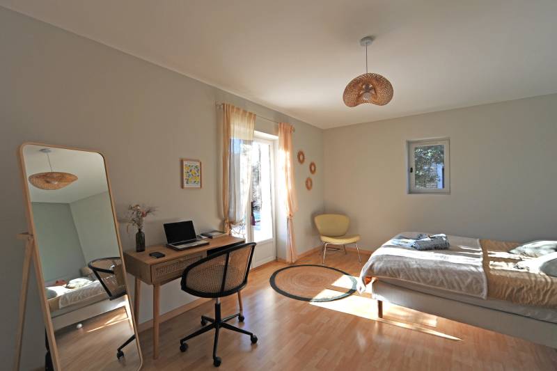 For sale in the hills above Gordes: an 8,500-square-meter property featuring two separate houses and a swimming pool.