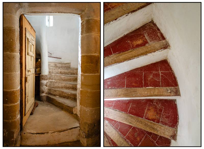 The castle tower: Grand entrance leading to the stone spiral staircase, the home's centerpiece.
