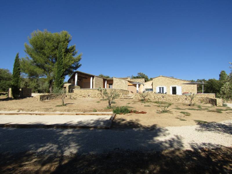 For rent, traditional Provençal stone house near the village of Gordes with pool and panoramic valley views.