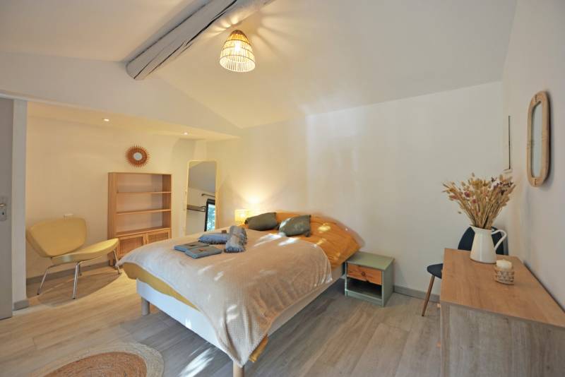 For sale in the hills above Gordes: an 8,500-square-meter property featuring two separate houses and a swimming pool.