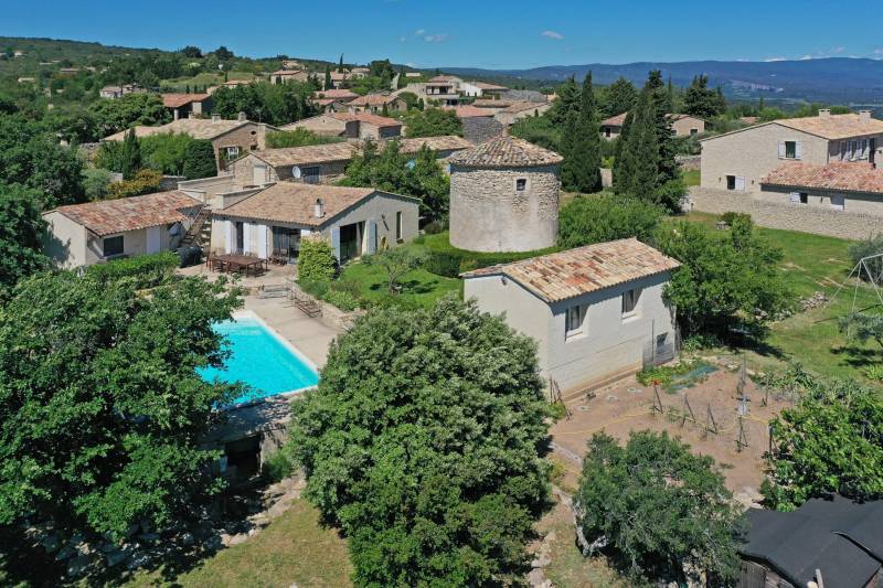 rare village property in dominant position with swimming pool and outbuildings.