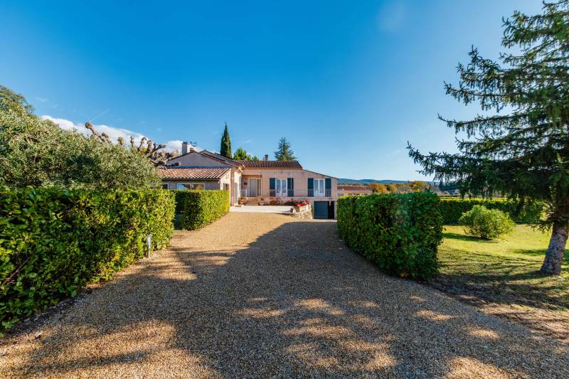 Gated access to the property with fully fenced landscaped grounds, carports, and proximity to Mont Ventoux hiking trails.