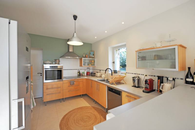 For sale in the hills above Gordes: an 8,500-square-meter property featuring two separate houses and a swimming pool.