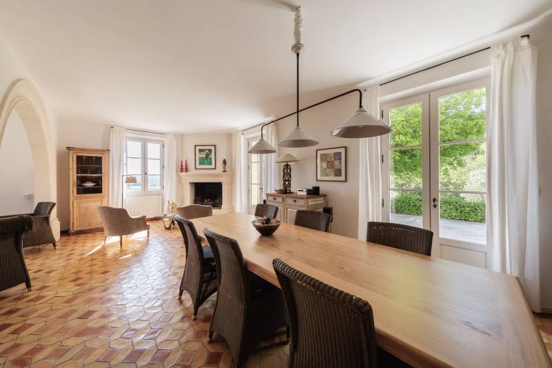 For rent in Gordes, stone Bastide in an elevated position with Luberon views, spacious grounds, and pool.