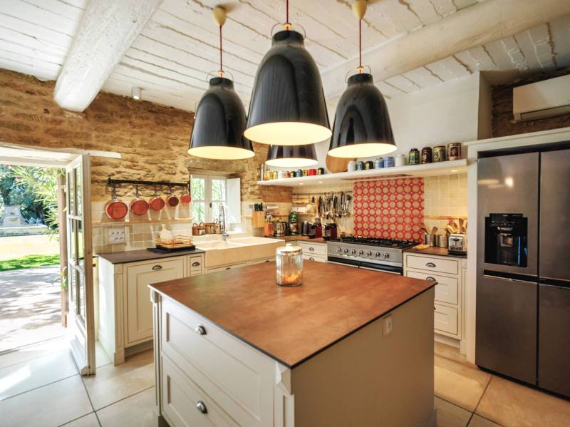 For rent at the foot of Gordes, stunning renovated Mas in a very peaceful setting with pool, summer kitchen and tennis court.