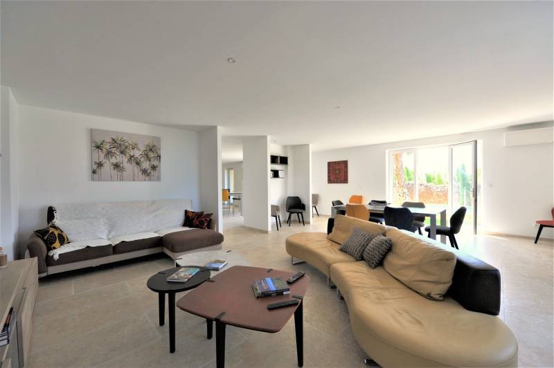 Contemporary stone villa within walking distance of Gordes, with heated pool, panoramic views and elegant outdoor living spaces.