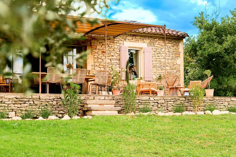For sale in the hills above Gordes: an 8,500-square-meter property featuring two separate houses and a swimming pool.