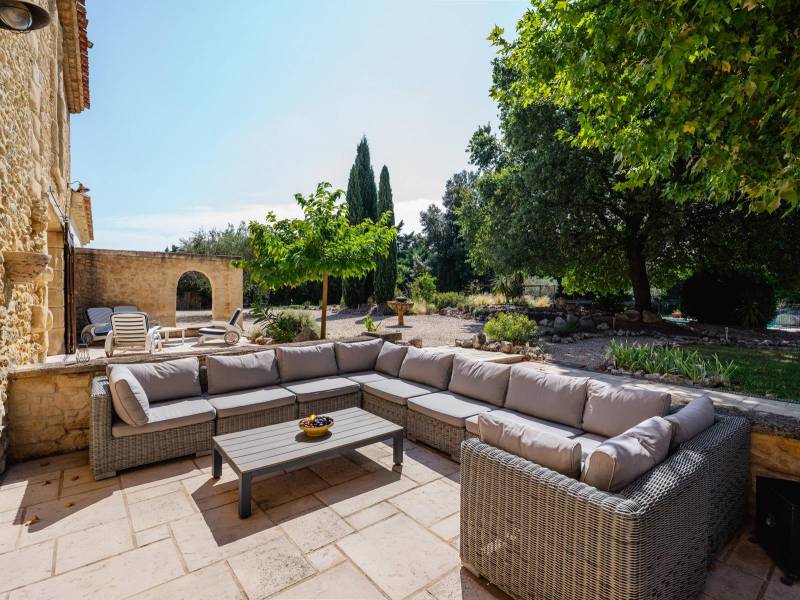 Conviviality and Relaxation: Landscaped terrace with outdoor lounge areas, set within 2,835 m² of private grounds.