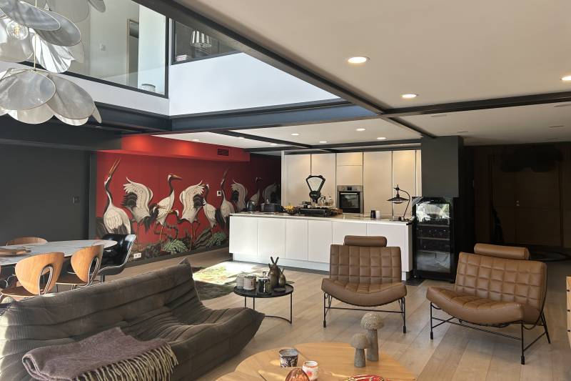 In Saint-Rémy-de-Provence, in the village center, a stunning, unique 150-square-meter loft with a courtyard and swimming pool.