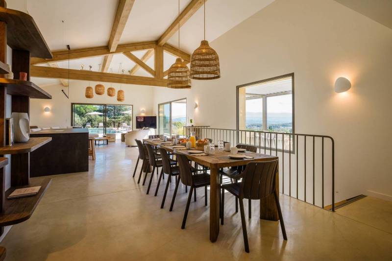 Spectacular contemporary stone villa with a pool, situated on a hilltop overlooking the valley, for sale near Saint-Saturnin-les-Apt.