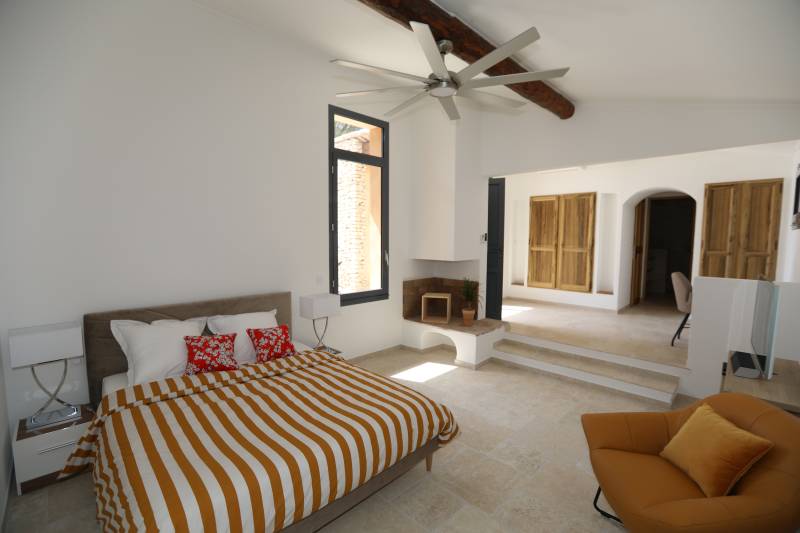 For rent, traditional Provençal stone house near the village of Gordes with pool and panoramic valley views.