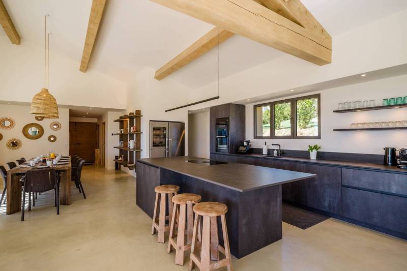 Spectacular contemporary stone villa with a pool, situated on a hilltop overlooking the valley, for sale near Saint-Saturnin-les-Apt.