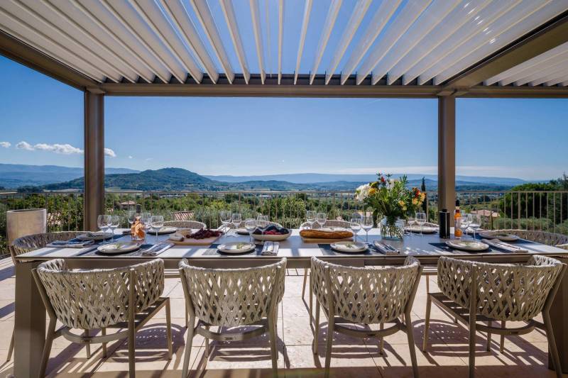 Spectacular contemporary stone villa with a pool, situated on a hilltop overlooking the valley, for sale near Saint-Saturnin-les-Apt.