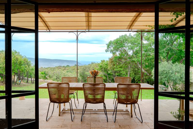 For sale in the hills above Gordes: an 8,500-square-meter property featuring two separate houses and a swimming pool.