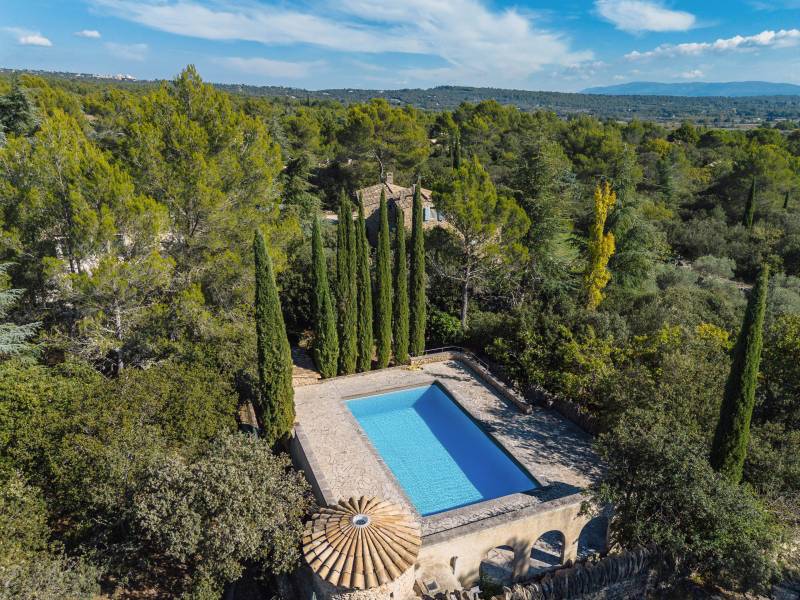 Landscaped ground with swimming pool