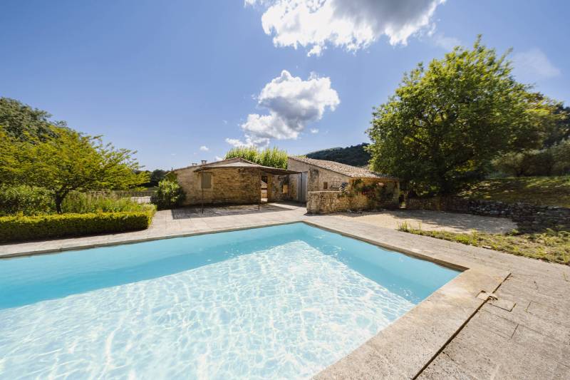 Exclusive listing - In the Luberon, superb farmhouse totally renovated with outbuildings set in 1.5 hectares facing the south.