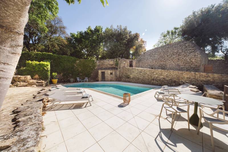 For rent, charming stone house with pool, in a peaceful setting just steps from the center of Gordes village.
