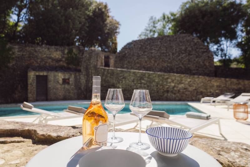 For rent, charming stone house with pool, in a peaceful setting just steps from the center of Gordes village.