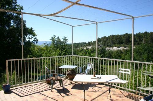 On the Monts de Vaucluse, stone house on the slope of a small hill