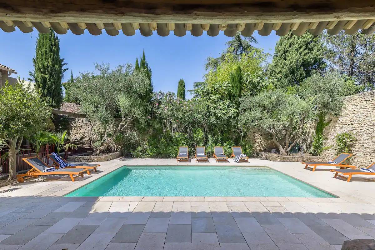 Authentic renovated House in a Gordes hamlet with pool, landscaped garden and expansive pool-house with outdoor summer kitchen