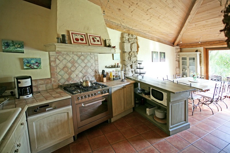 For sale, in Pays des Sorgues, superb stone property with guests houses and 2 swimming pools on lovely grounds