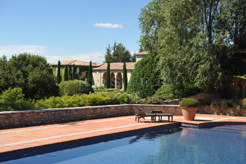 For sale, in Luberon by ROSIER, large property including the main house, a park over 35 hectares (86 acres), guest house, friend house, heated swimming pool, pool house, tennis court