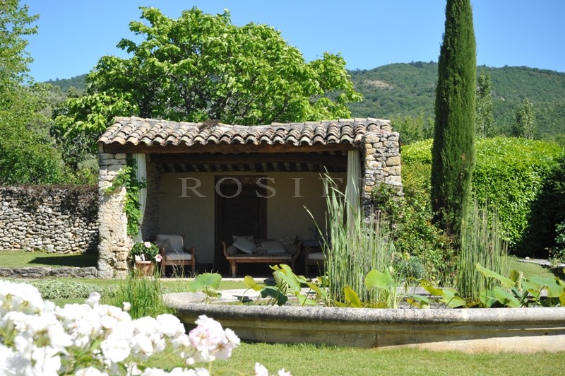 For sale, in Luberon by ROSIER, large property including the main house, a park over 35 hectares (86 acres), guest house, friend house, heated swimming pool, pool house, tennis court