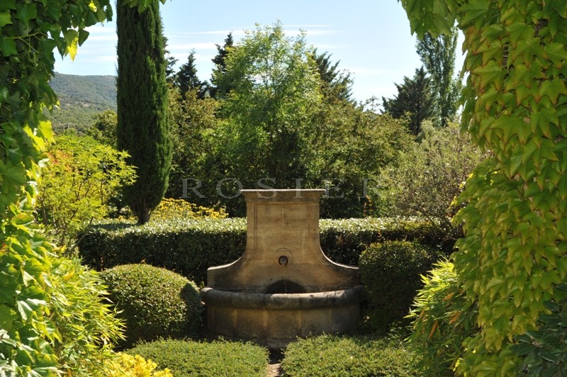 For sale, in Luberon by ROSIER, large property including the main house, a park over 35 hectares (86 acres), guest house, friend house, heated swimming pool, pool house, tennis court