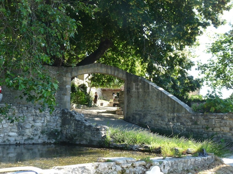 Stone farmhouse of the 18th century on the edge