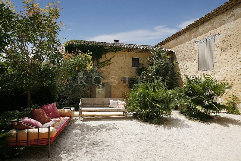 Between Luberon and Alpilles, for sale, provencal castle with outbuildings, on several hectares of hilly land with swimming pool