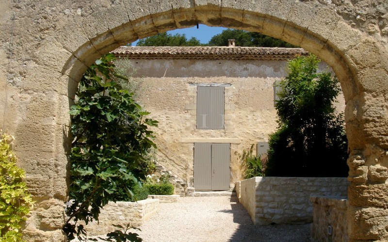 Between Luberon and Alpilles, for sale, provencal castle with outbuildings, on several hectares of hilly land with swimming pool