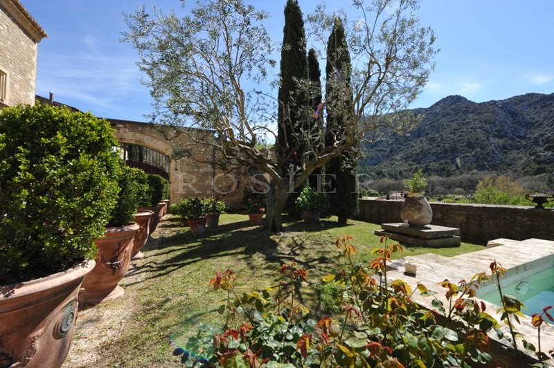 Luberon, for sale, superb stone village house with garden, swimming pool, views on the provençal countryside