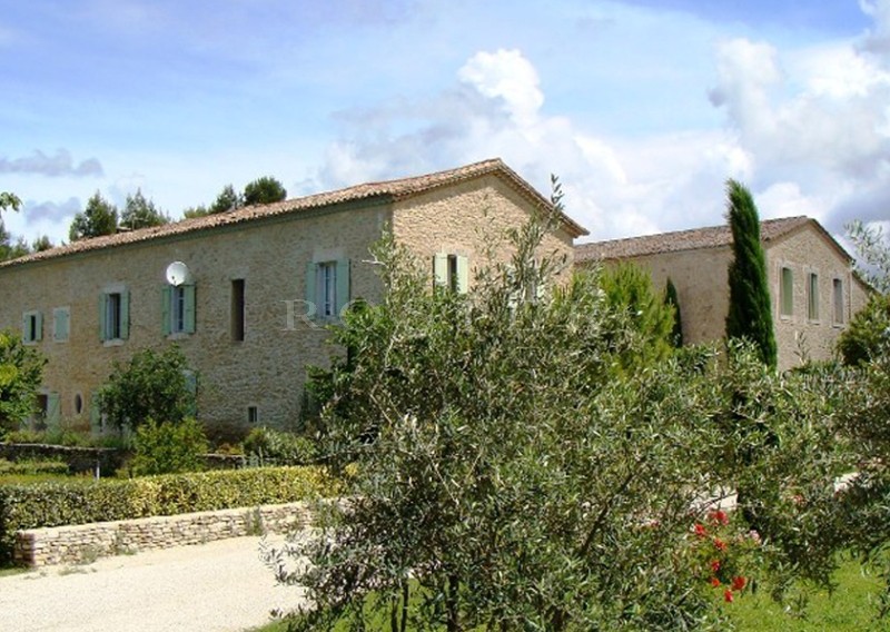 Near Isle sur la Sorgue in Provence, for sale, an authentic restored property a former vineyard currently a large B&B