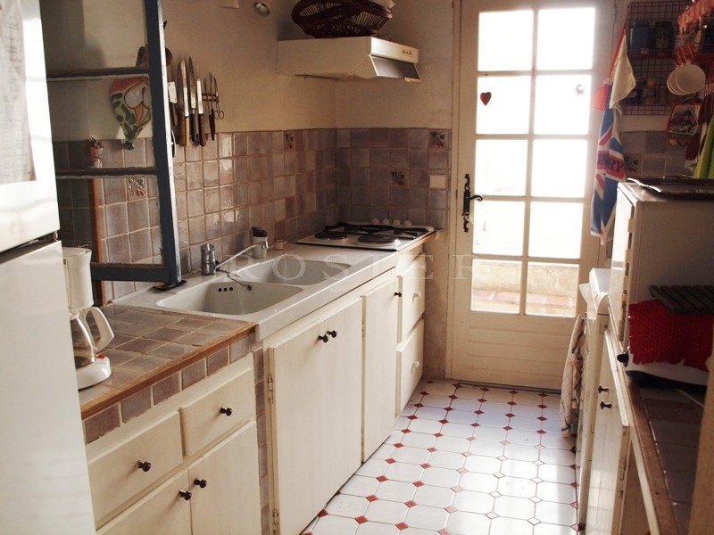 Provence, South Luberon, for sale, a  traditional XVIIth century village house with terrace and small garden in the heart of a delightful village.