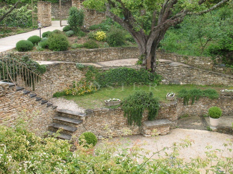 In the heart of one of the most beautiful villages in France: a traditional house for sale of the highest quality.