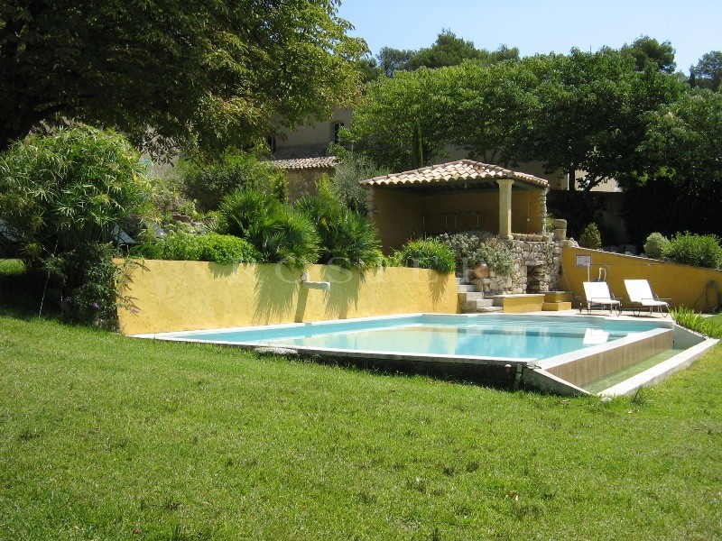 Close to the Alpilles mountains, for sale, traditional XVIIIth century manor house on 9000 m² of land, with swimming pool and breathtaking views 