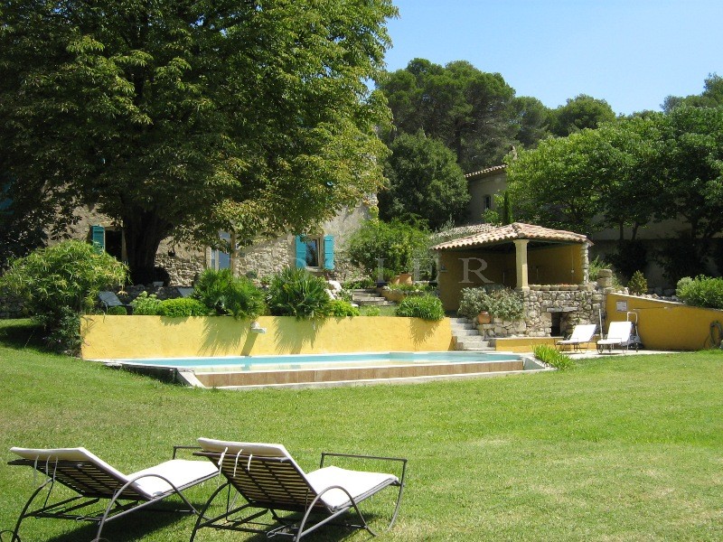 Close to the Alpilles mountains, for sale, traditional XVIIIth century manor house on 9000 m² of land, with swimming pool and breathtaking views 