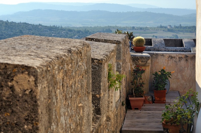 In a medieval village of the Luberon, for sale, a XIIth century property offering exceptional panoramic views