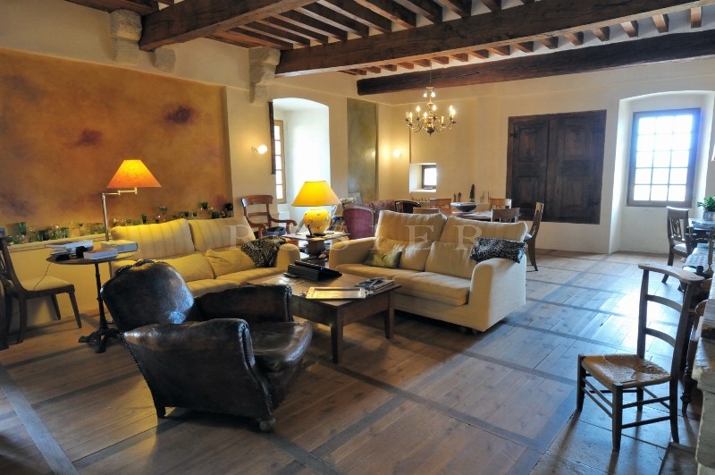 In a medieval village of the Luberon, for sale, a XIIth century property offering exceptional panoramic views